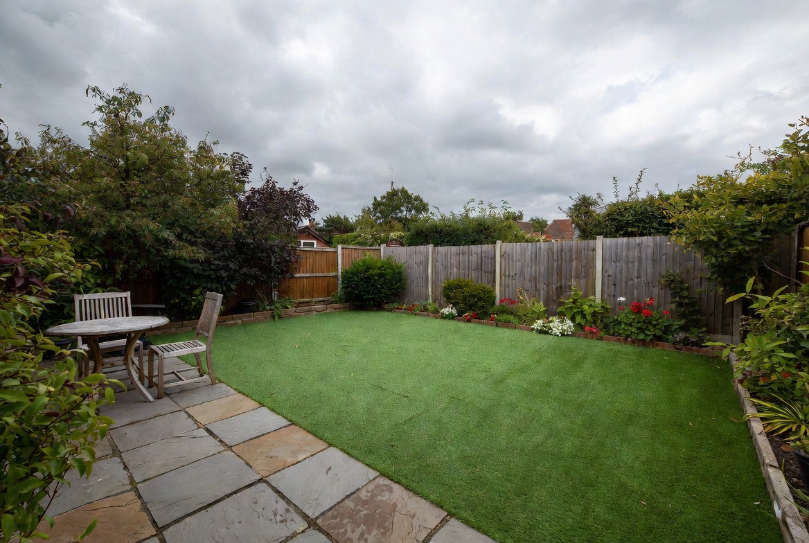 Family enjoying a low-maintenance artificial grass lawn in Liverpool