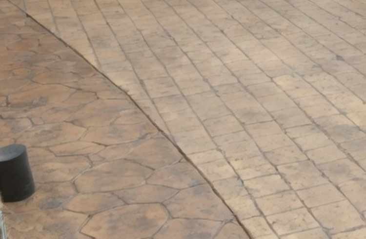 Before and after sealer on patterned driveway